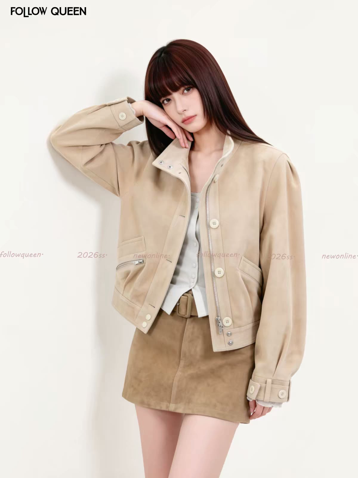 Model wearing a beige casual jacket with a brown mini skirt